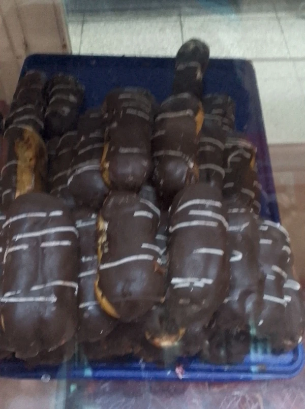 Eclear  relleno con Nutela y cobertura de choco's foto | AlKombomaster |  BizneCubano